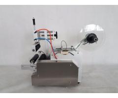 Automatic pneumatic round bottle labeling machine