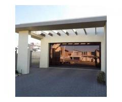 Aluminium glass garage doors and gates