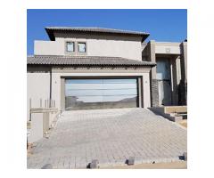 Aluminium glass garage doors and gates
