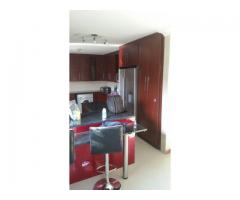 Kitchen units and solid wooden floors