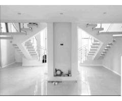 Rib and Block concrete and polystyrene slabs and designer staircases