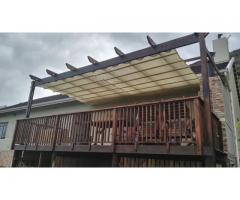 CARPORTS AND SHADE PORTS