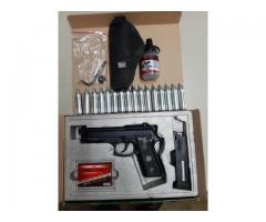 KWC blowback co2 gas gun with pellets and extra canisters